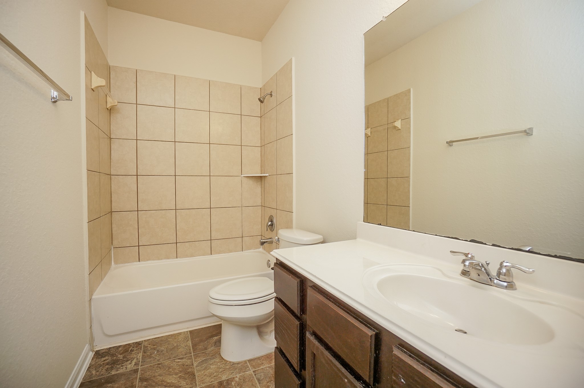 4822 Gingham Check Court Katy, TX 77449 - Photo 19 of 30 a bathroom with a bathtub shower sink mirror and toilet