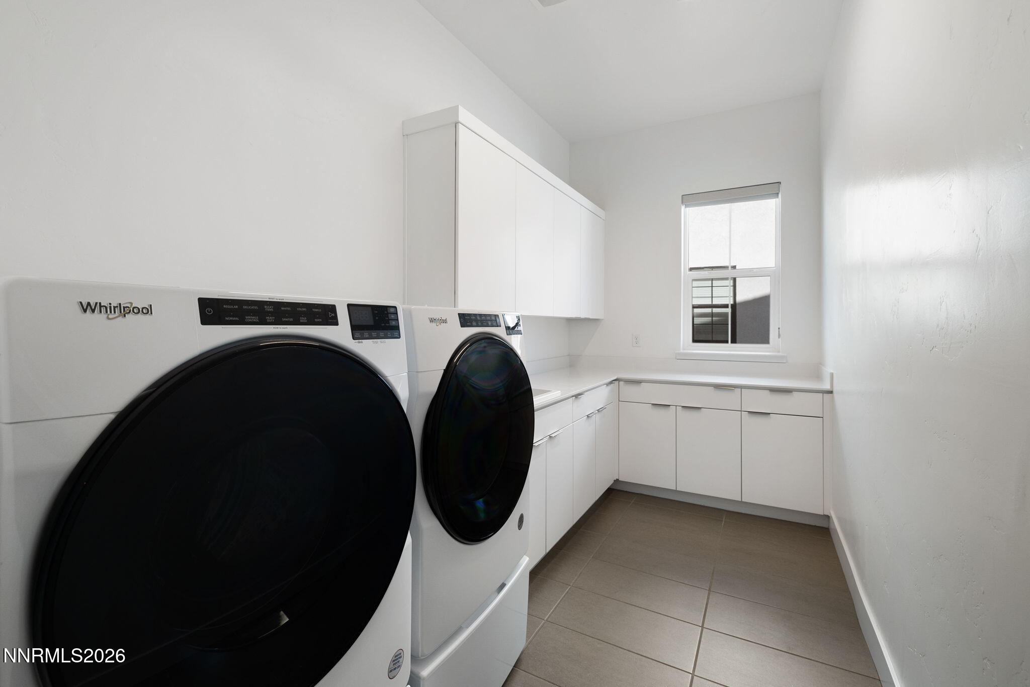 5406 Side Saddle Trail Reno, NV 89511 - Photo 26 of 39 a utility room with dryer and washer