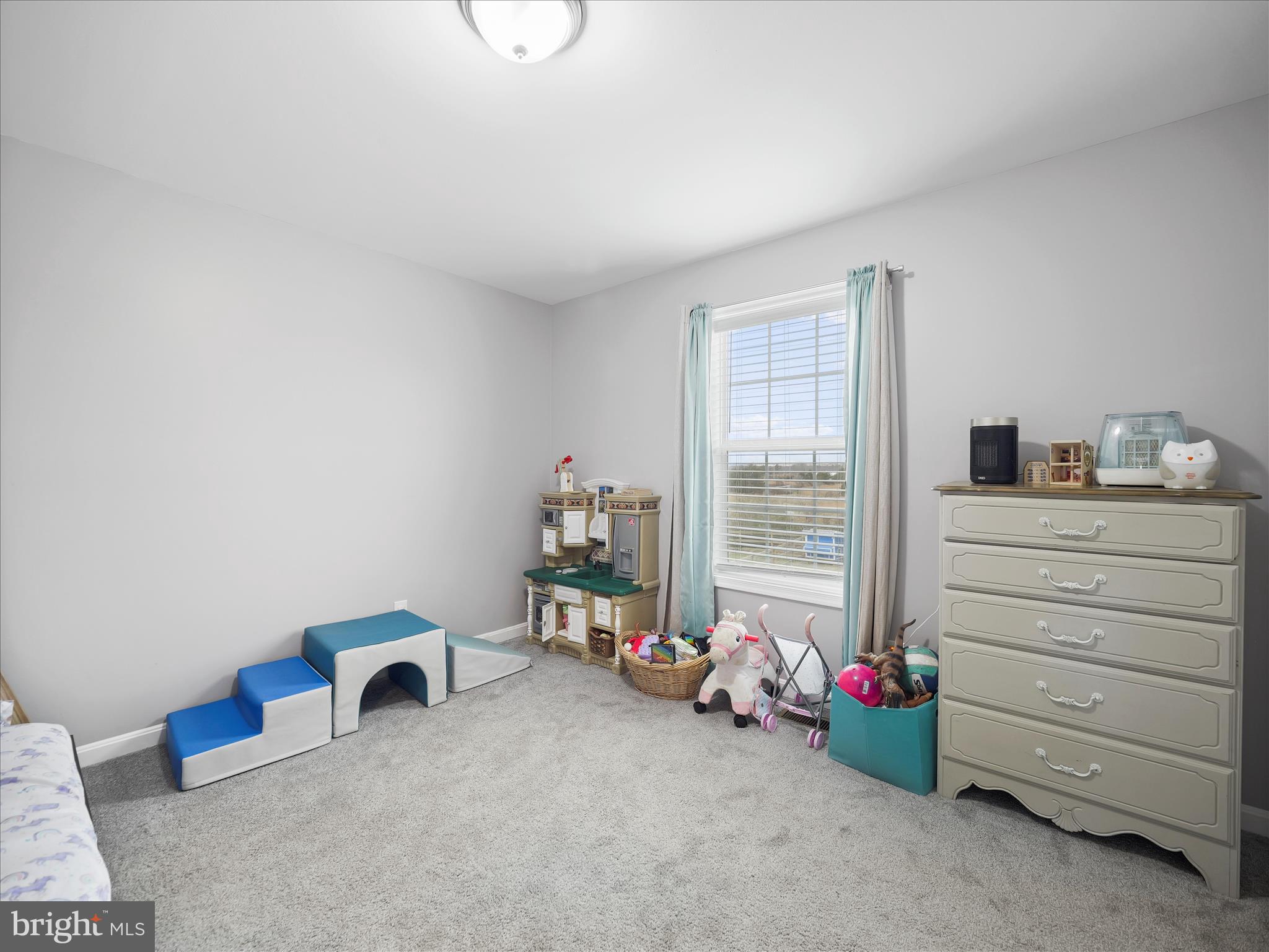 1885 Giles Mill Road Inwood, WV 25428 - Photo 13 of 40 a room with toys and a chandelier