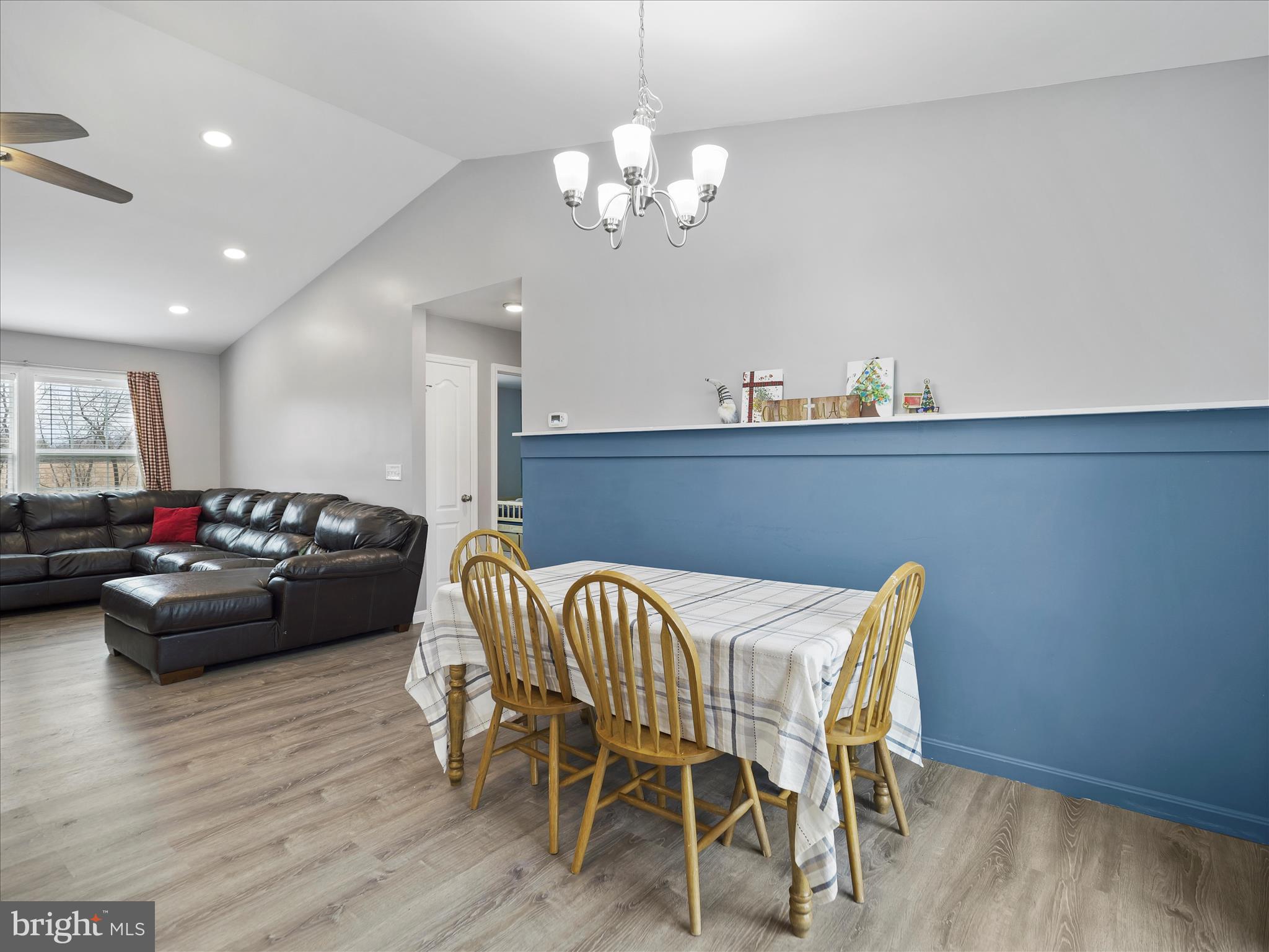 1885 Giles Mill Road Inwood, WV 25428 - Photo 23 of 40 a view of a dining room with furniture and wooden floor