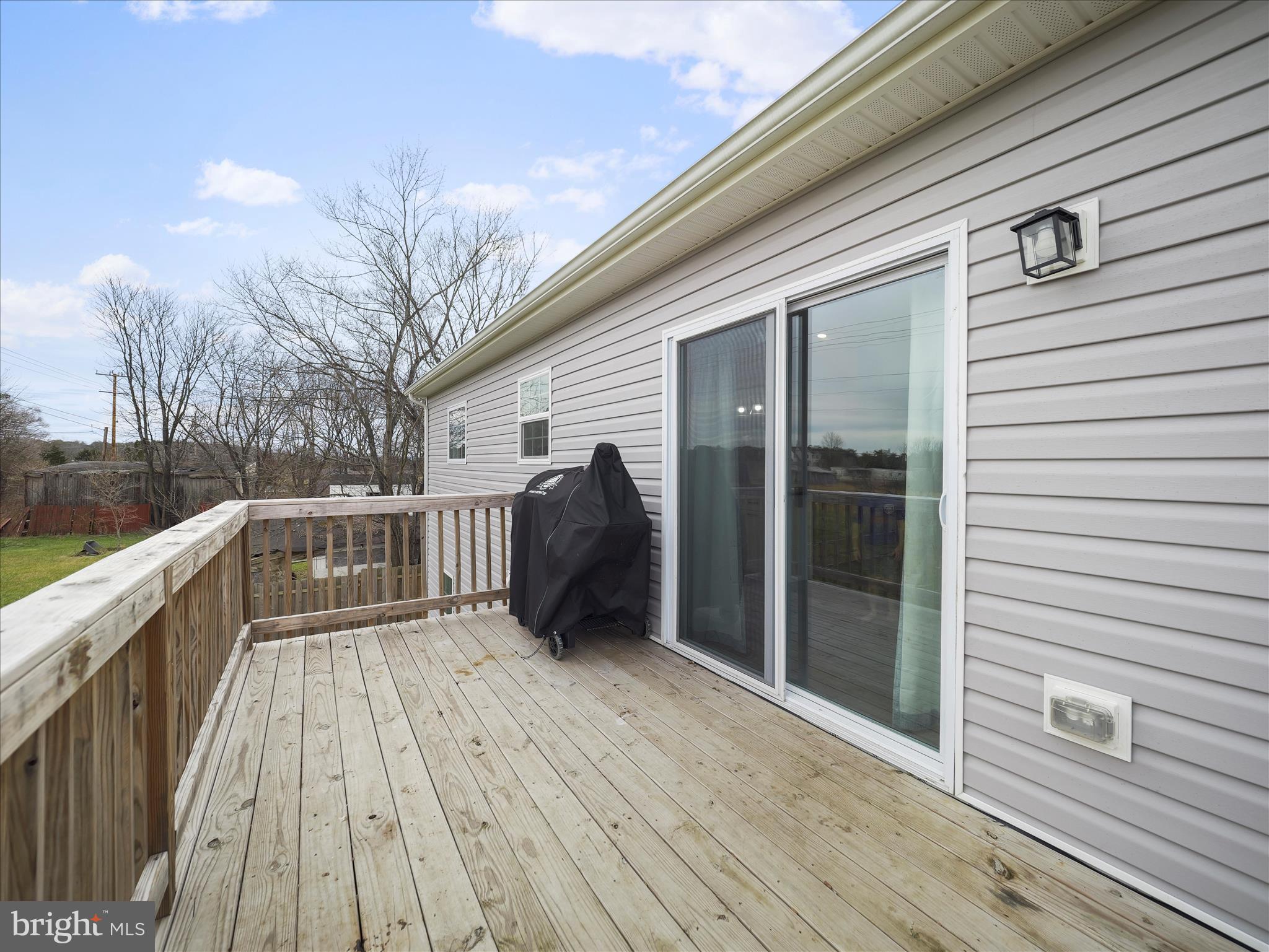 1885 Giles Mill Road Inwood, WV 25428 - Photo 40 of 40 a view of deck with wooden floor and fence