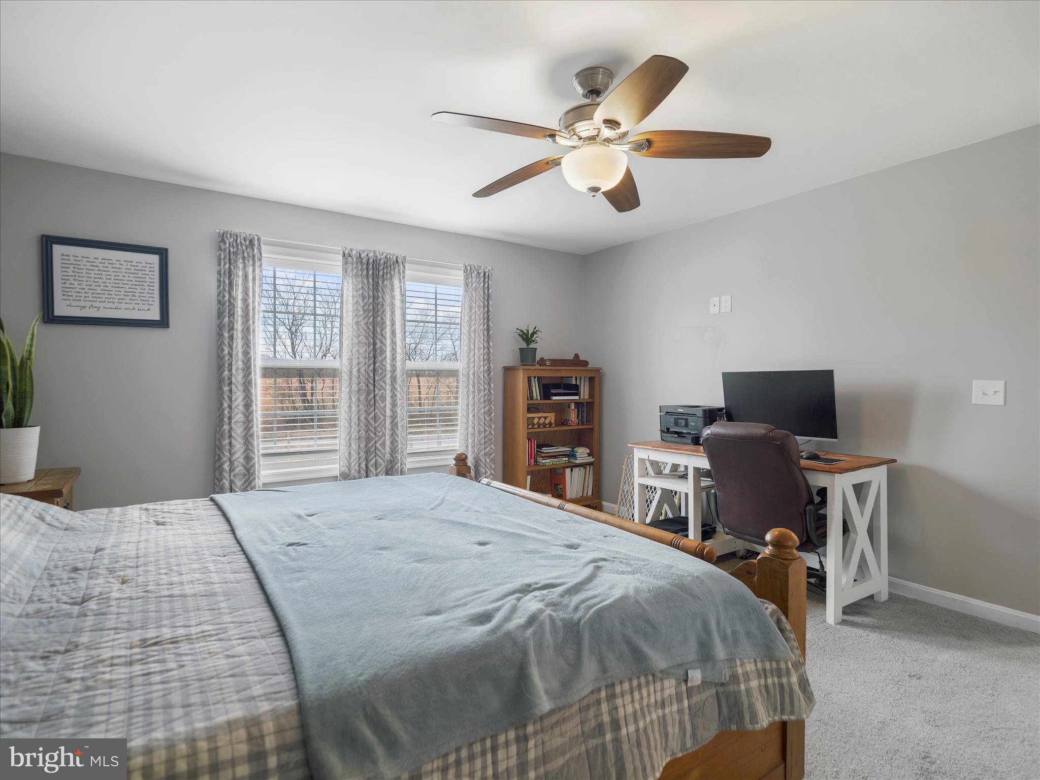 1885 Giles Mill Road Inwood, WV 25428 - Photo 7 of 40 a bedroom with a bed and a desk