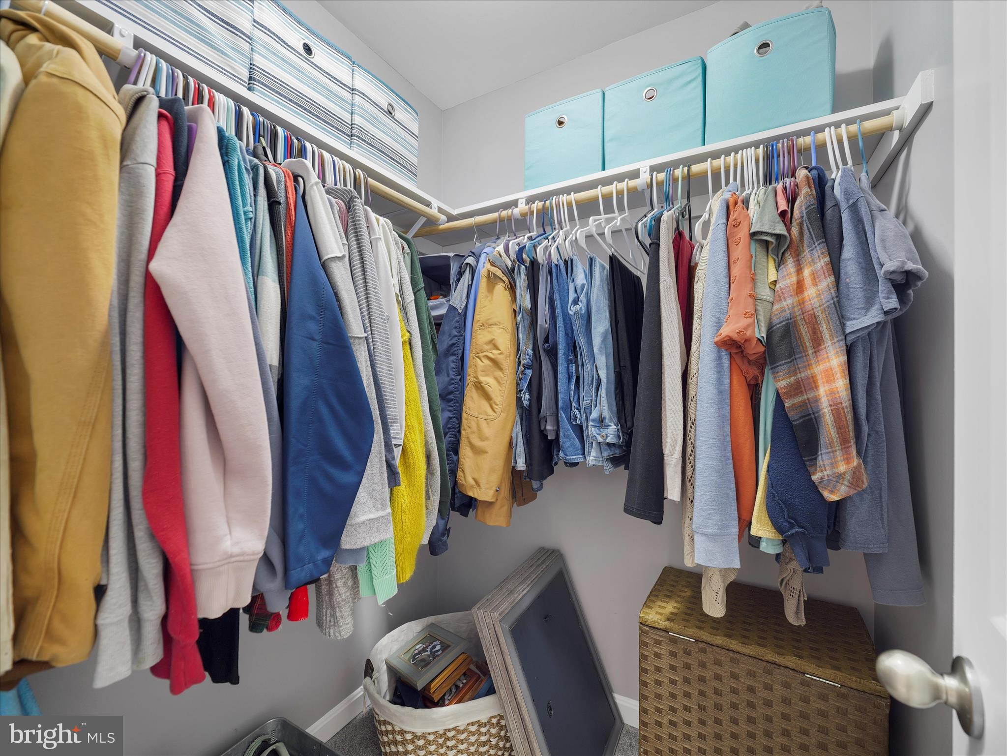 1885 Giles Mill Road Inwood, WV 25428 - Photo 9 of 40 a view of walk in closet with clothes and shoes