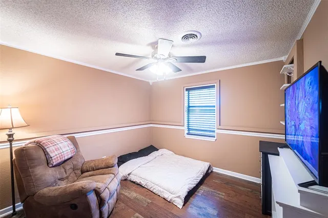 a bathroom with a granite countertop sink toilet and mirror
