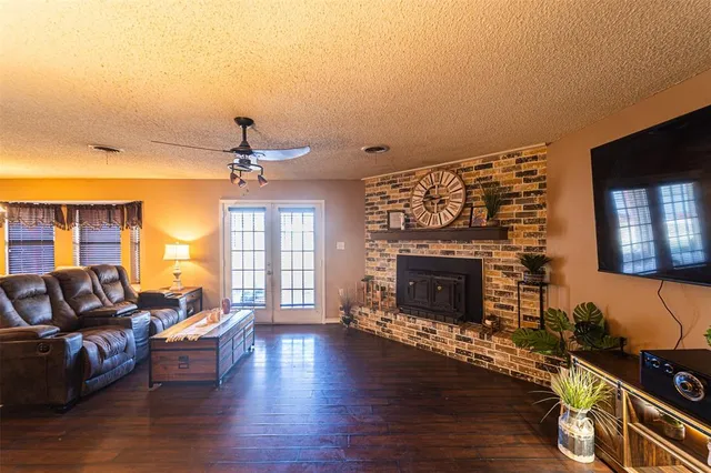 a building outdoor space with patio furniture and outdoor view