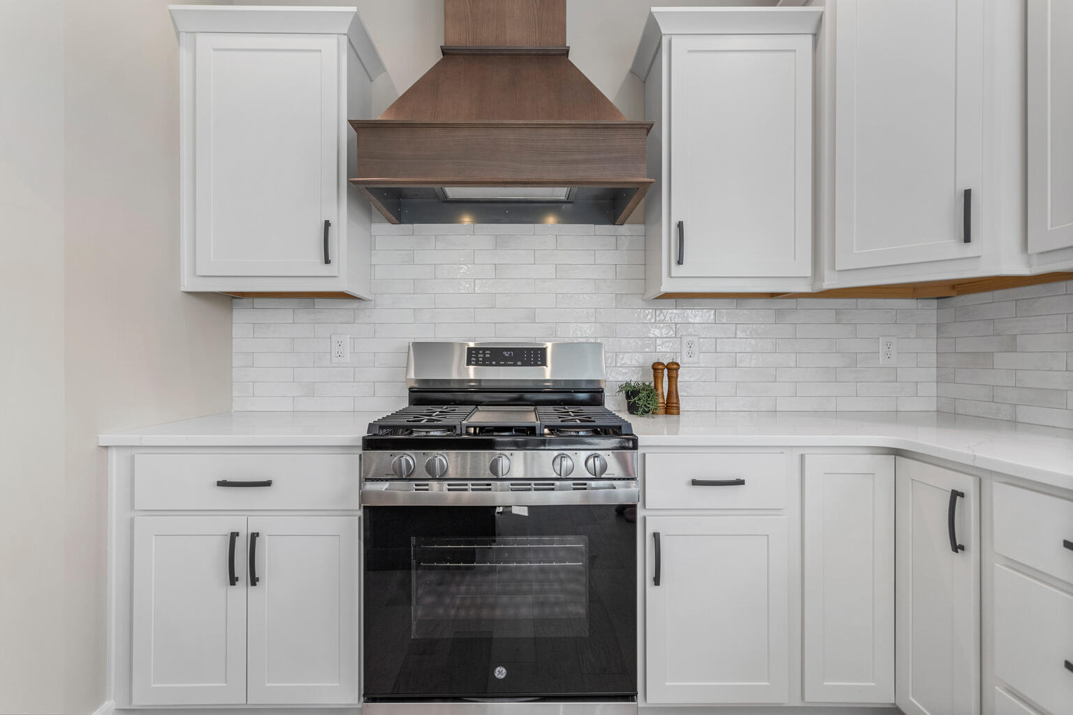 500 Prairie Meadows Drive Heyworth, IL 61745 - Photo 15 of 45 a kitchen with white cabinets and appliances