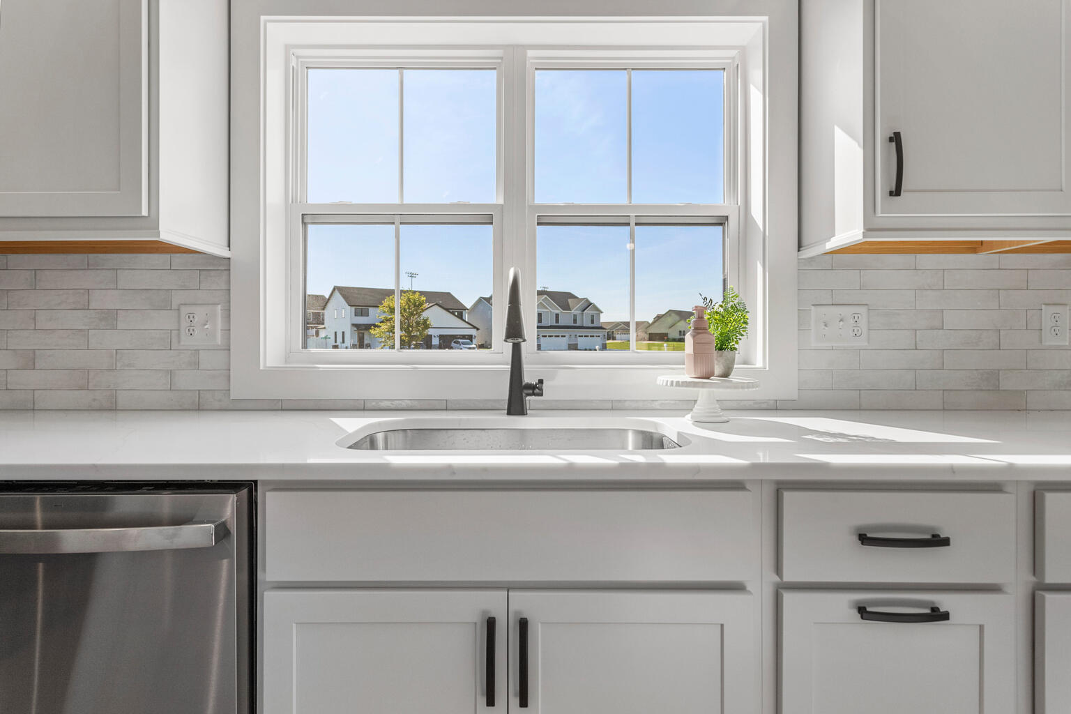 500 Prairie Meadows Drive Heyworth, IL 61745 - Photo 16 of 45 a kitchen with a sink and a window