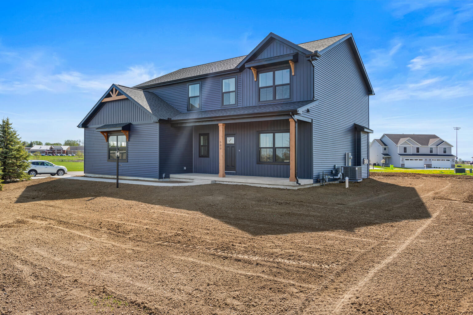 500 Prairie Meadows Drive Heyworth, IL 61745 - Photo 2 of 45 a front view of a house with a yard