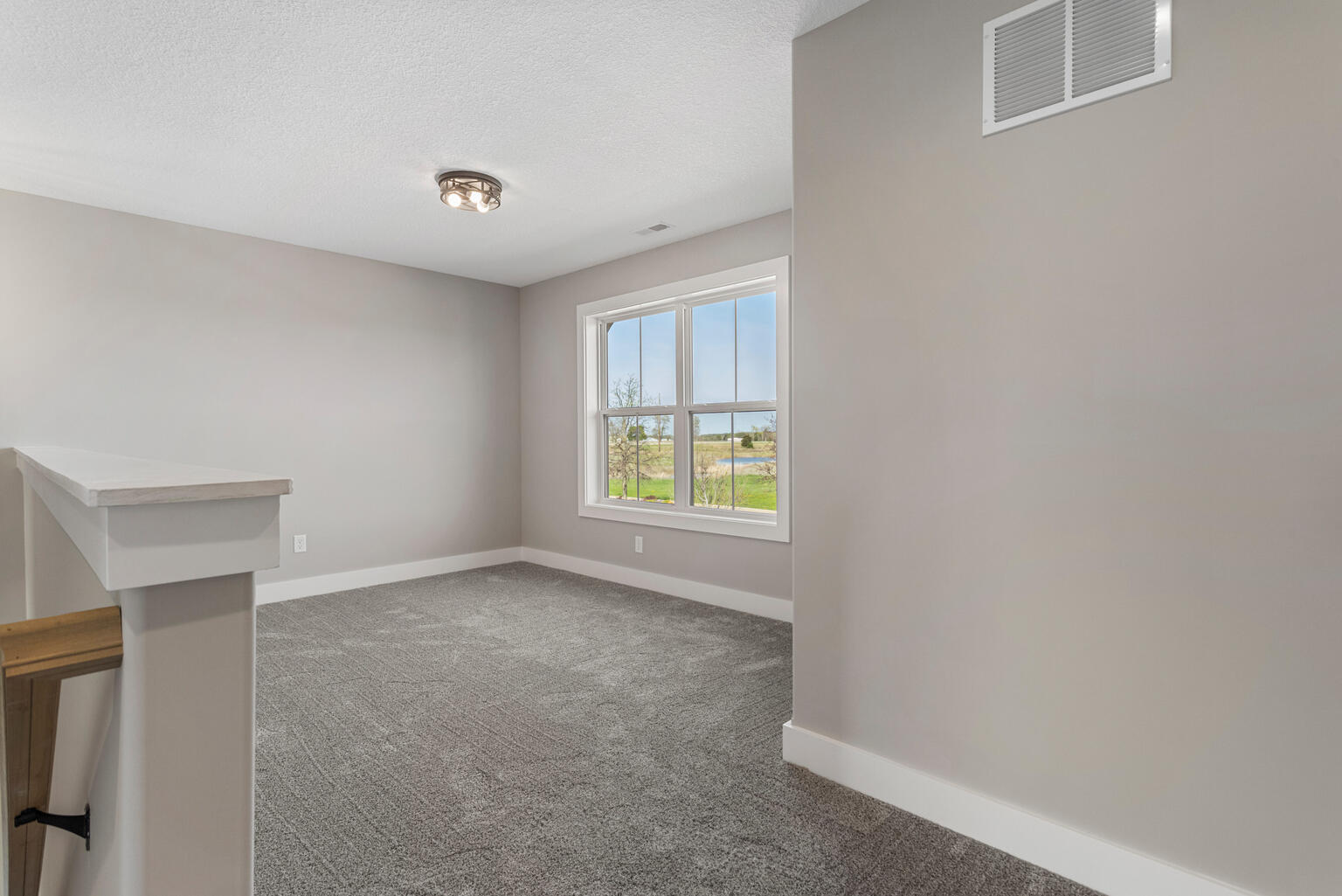 500 Prairie Meadows Drive Heyworth, IL 61745 - Photo 21 of 45 a view of an empty room with a window
