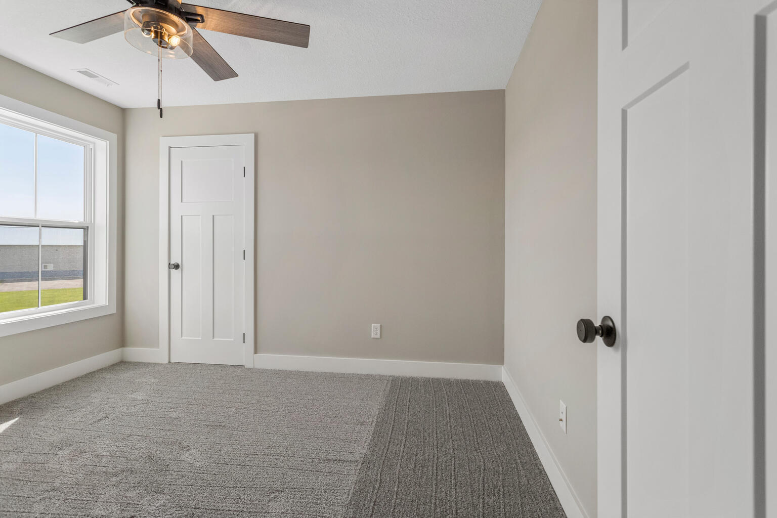 500 Prairie Meadows Drive Heyworth, IL 61745 - Photo 32 of 45 wooden floor in an empty room with a window