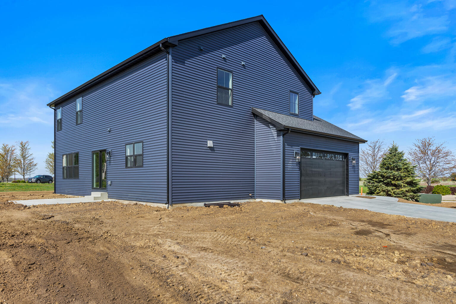 500 Prairie Meadows Drive Heyworth, IL 61745 - Photo 42 of 45 a front view of a house with a yard
