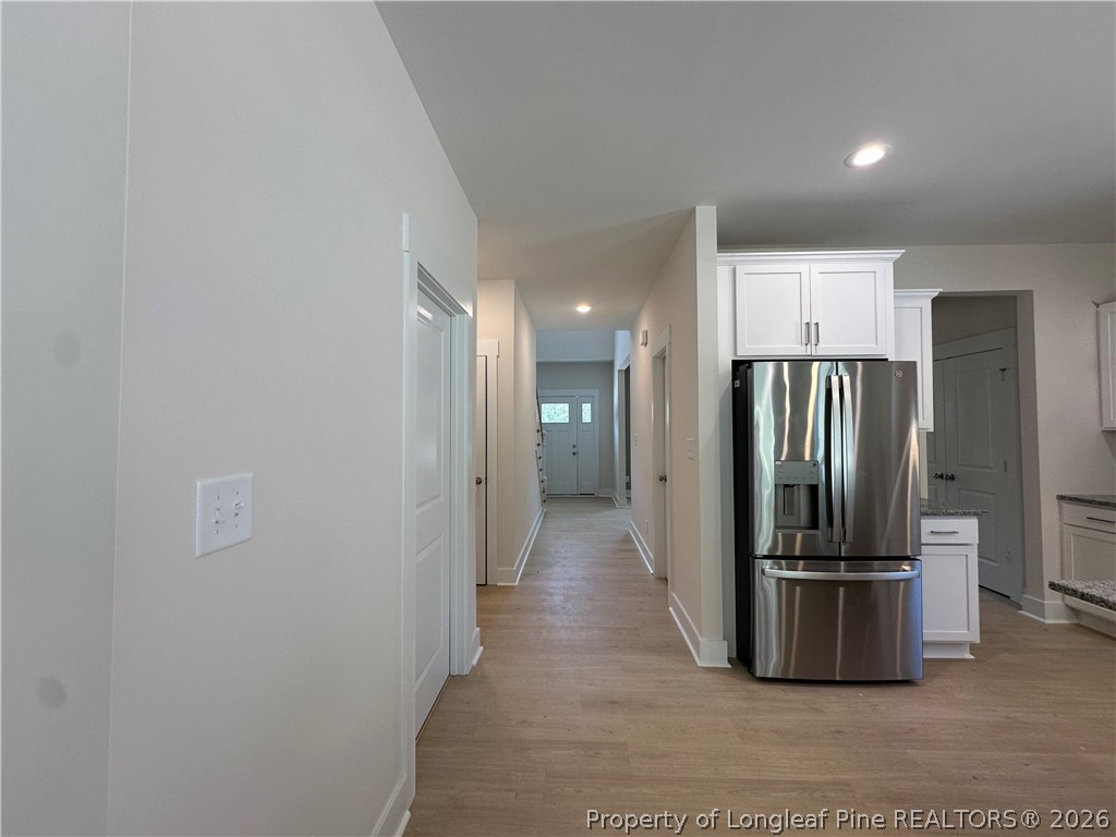 2908 Calloway Road Raeford, NC 28376 - Photo 13 of 25 a view of a kitchen with a refrigerator