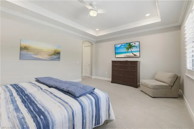 a bedroom with a bed and furniture