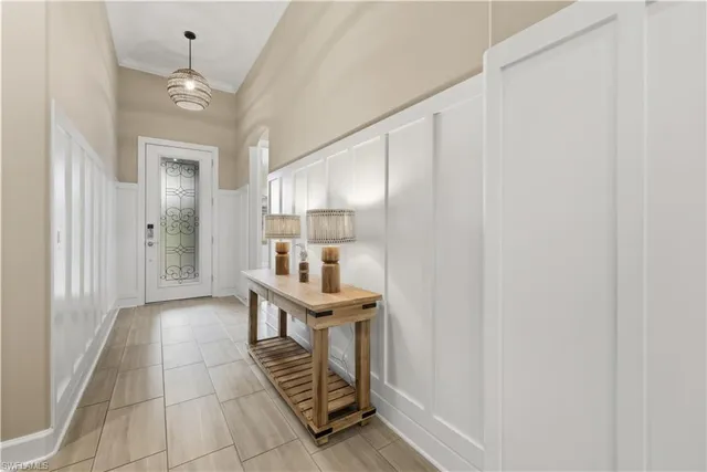 a very nice looking room with a dining table and chairs
