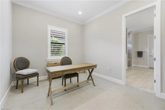 a workspace with furniture and a window