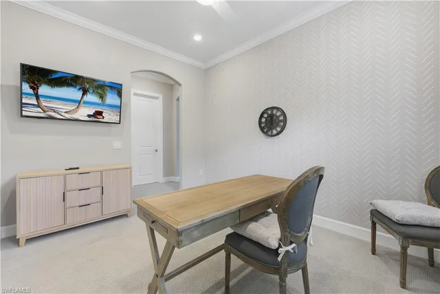 a view of a workspace with furniture