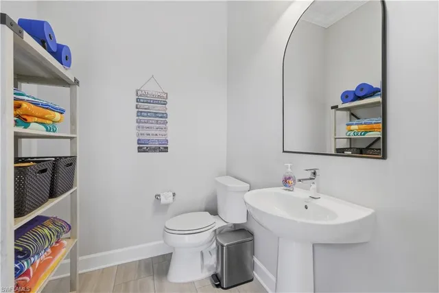 a bathroom with a sink and a toilet