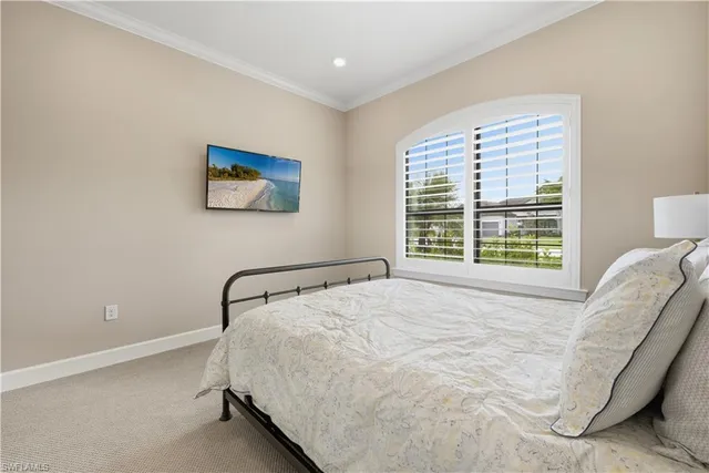 a bedroom with a bed and a cabinets