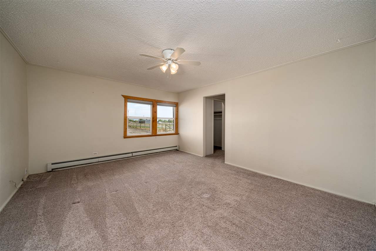 2052 I Road Fruita, CO 81521 - Photo 11 of 31 a view of an empty room with a window