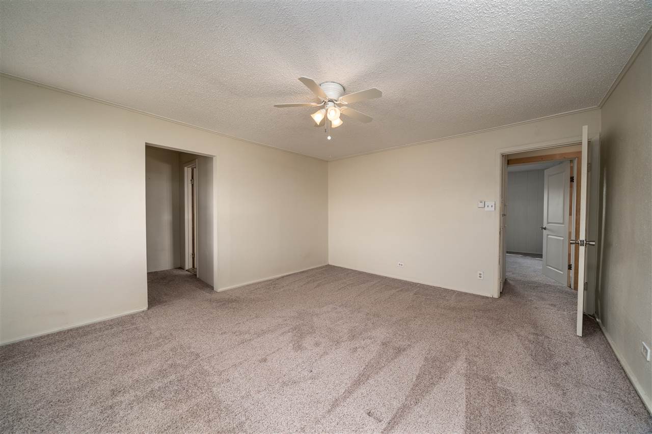 2052 I Road Fruita, CO 81521 - Photo 12 of 31 an empty room with closet and a ceiling fan