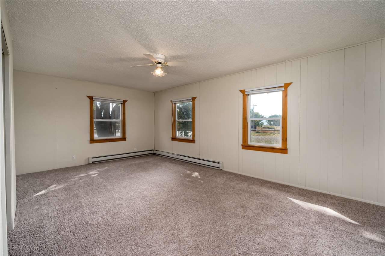2052 I Road Fruita, CO 81521 - Photo 15 of 31 an empty room with windows and closet