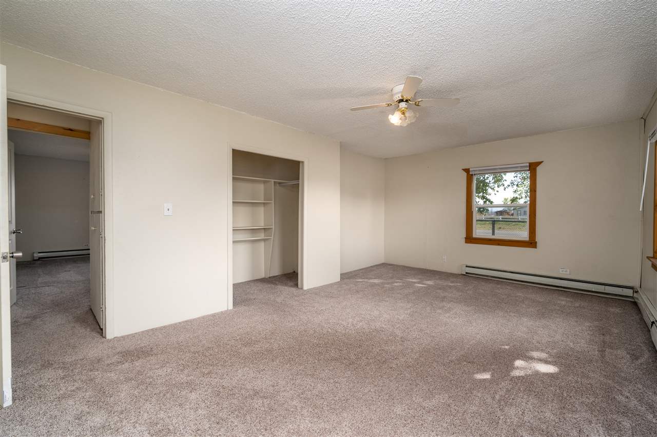 2052 I Road Fruita, CO 81521 - Photo 16 of 31 an empty room with windows and closet