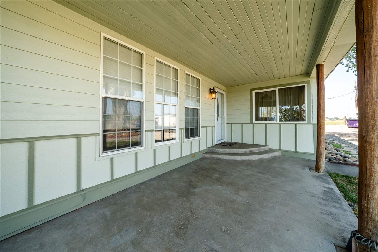 2052 I Road Fruita, CO 81521 - Photo 2 of 31 a view of empty room with floor to ceiling window