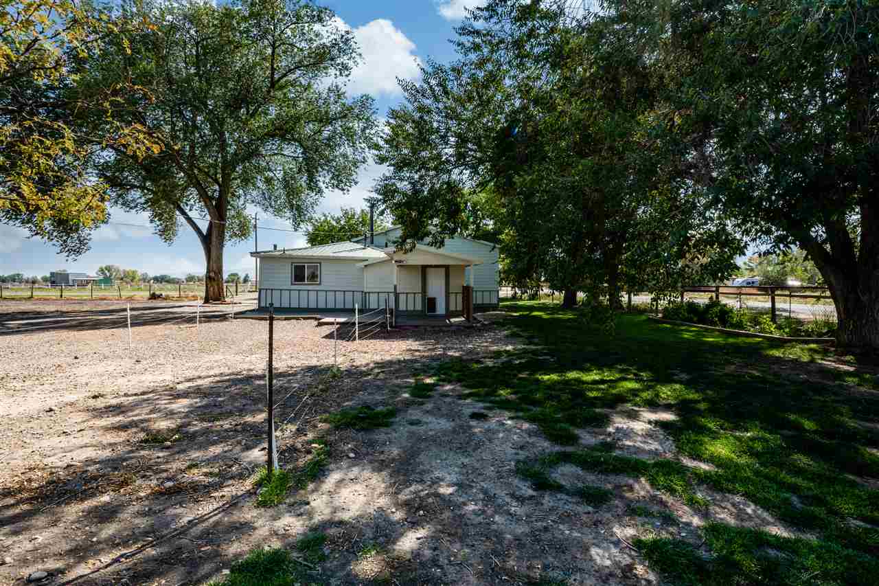 2052 I Road Fruita, CO 81521 - Photo 5 of 31 a house view with a backyard space
