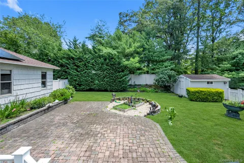a view of a garden with a bench