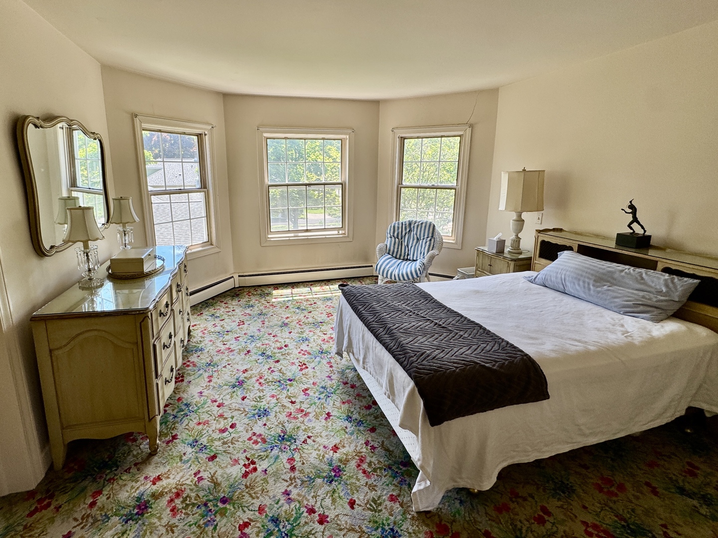 933 Harms Road Glenview, IL 60025 - Photo 10 of 25 a bedroom with a bed wooden floor and window