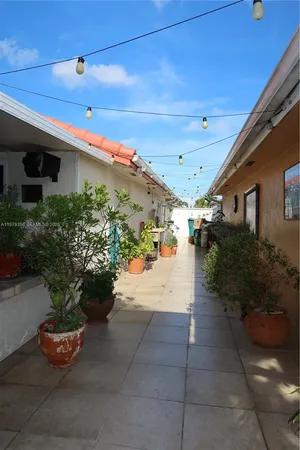 a room with chandelier and closet