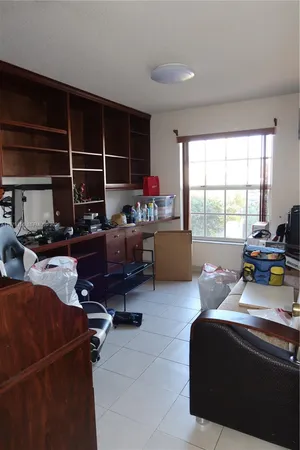 a backyard of a house with seating space