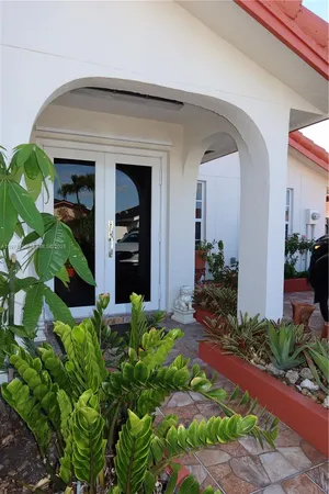 a front view of a house with entryway