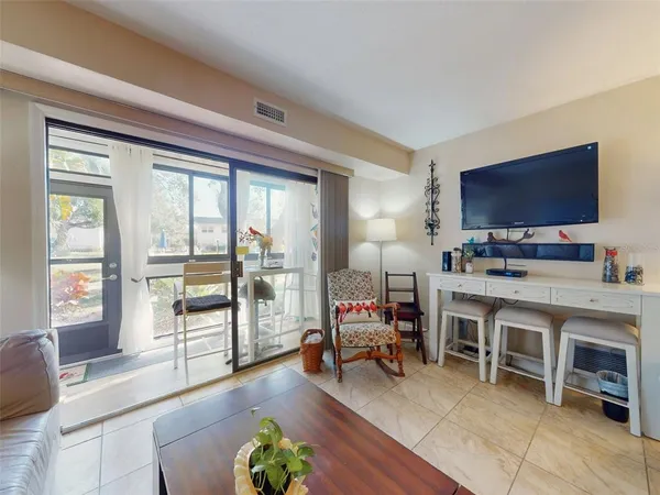 a shelf with books and knick knacks on it