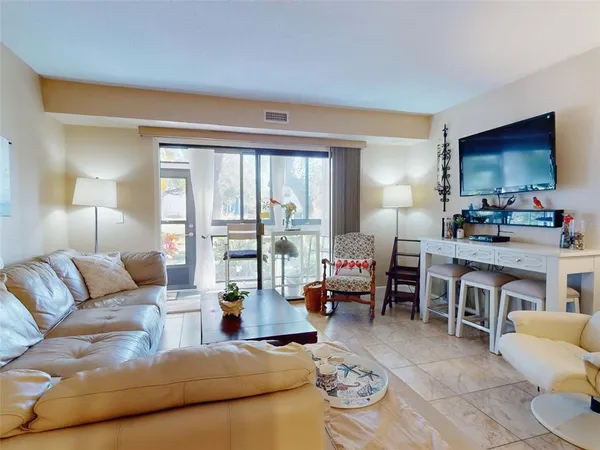 a view of swimming pool with lounge chair