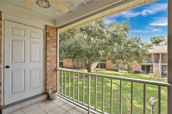 a view of a balcony with an outdoor space