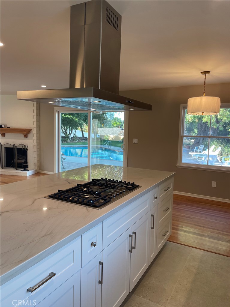 35 Ranchview Road Rolling Hills Estates, CA 90274 - Photo 14 of 35 a kitchen with stainless steel appliances granite countertop a stove a sink and a microwave