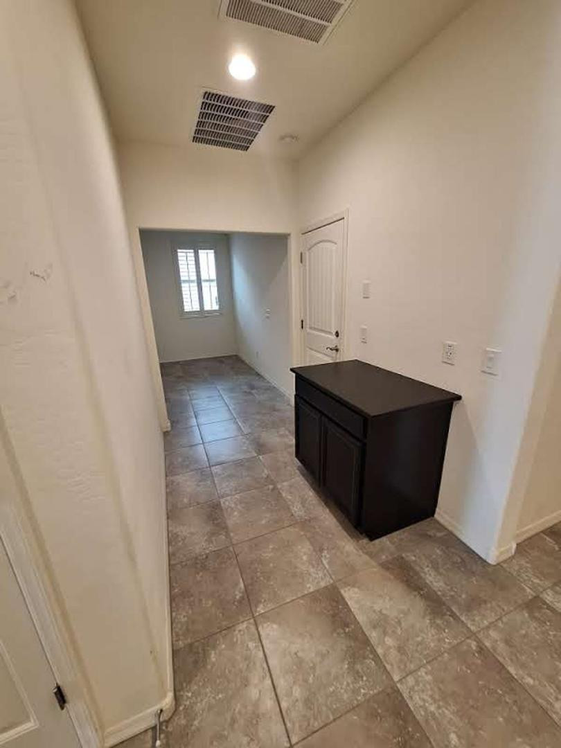 18541 West Mescal Street Surprise, AZ 85388 - Photo 24 of 31 a view of an empty room and window