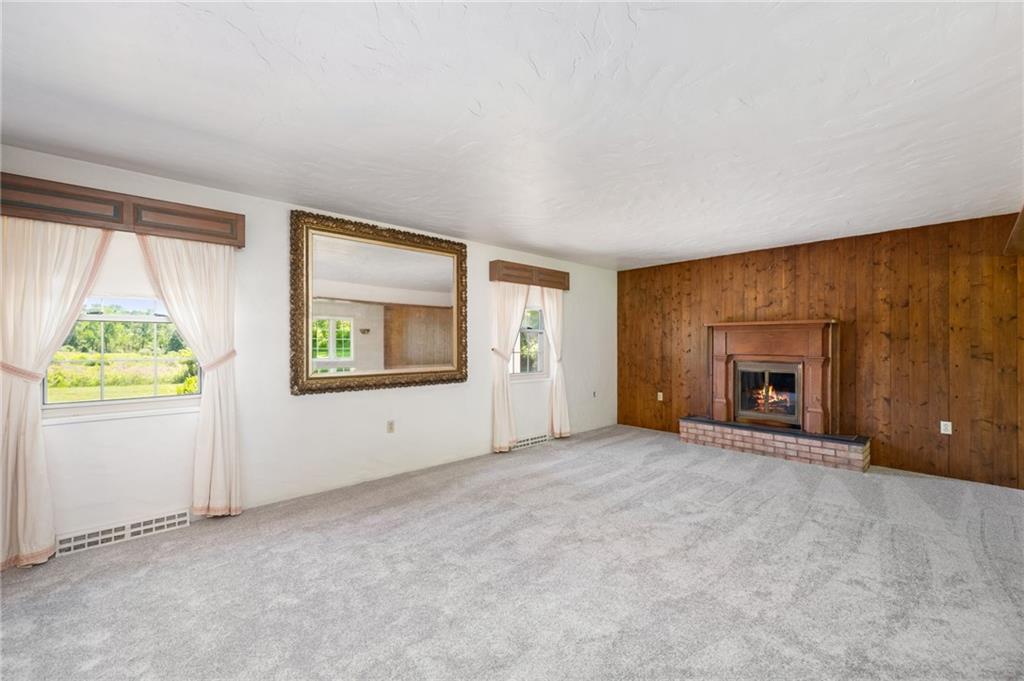 113 Iron Bridge Road Sarver, PA 16055 - Photo 25 of 49 an empty room with windows and fireplace