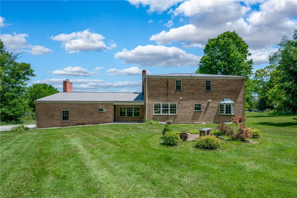 113 Iron Bridge Road Sarver, PA 16055 - Photo 43 of 49 a aerial view of a house with table and chairs