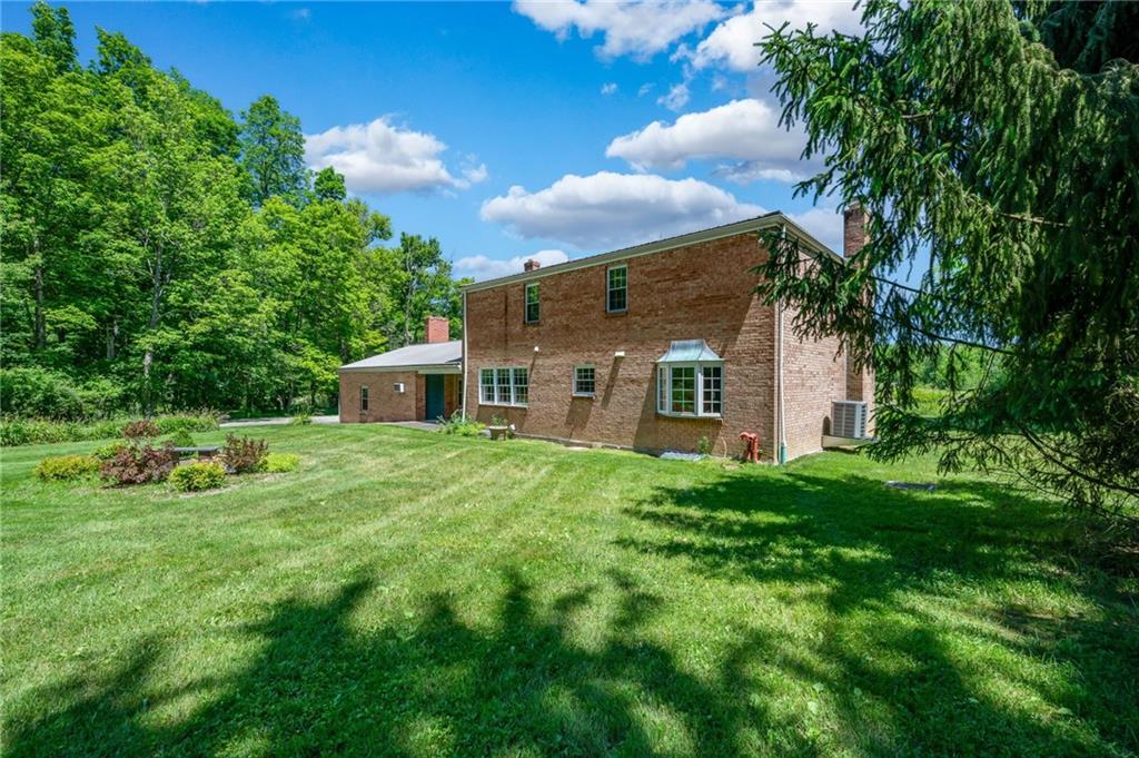 113 Iron Bridge Road Sarver, PA 16055 - Photo 45 of 49 a view of a house with backyard and garden