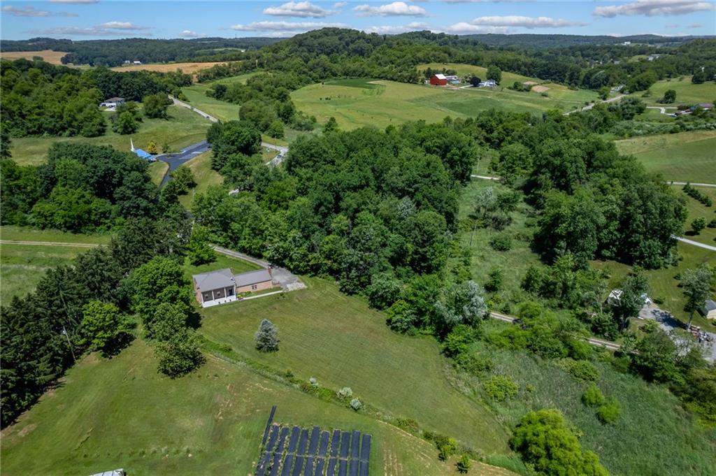 113 Iron Bridge Road Sarver, PA 16055 - Photo 8 of 49 an aerial view of a house with yard