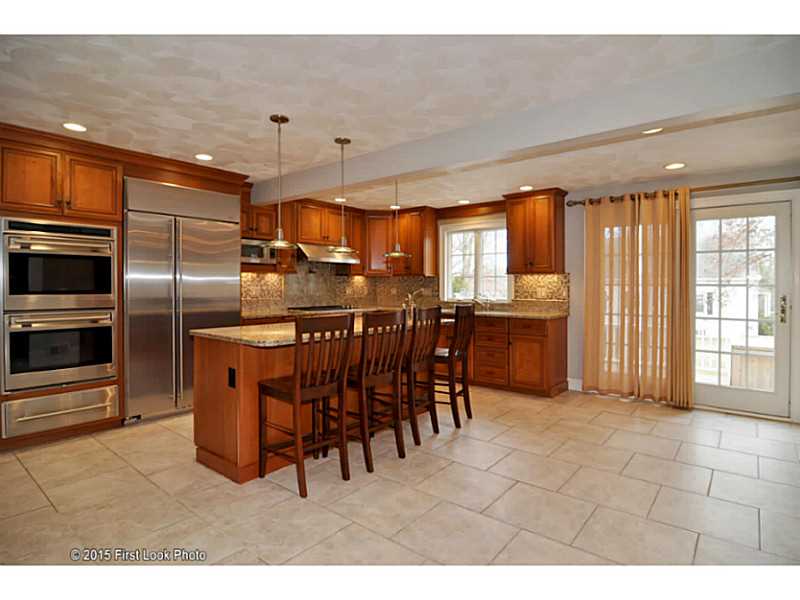 3 Deer Run Cranston, RI 02921 - Photo 1 of 25 Kitchen. GRANITE, CUSTOM DOVETAIL CHERRY W/ FISNISH CLOSE, 2 PANTRIES W/ SLIDE OUT SHELVES.