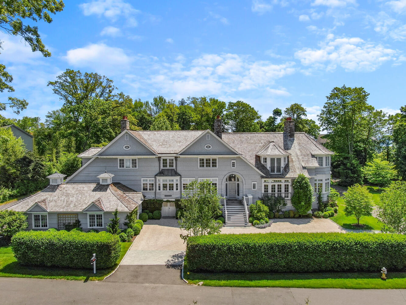 43 Contentment Island Road Darien, CT 06820 - Photo 1 of 59 a front view of house with yard and green space