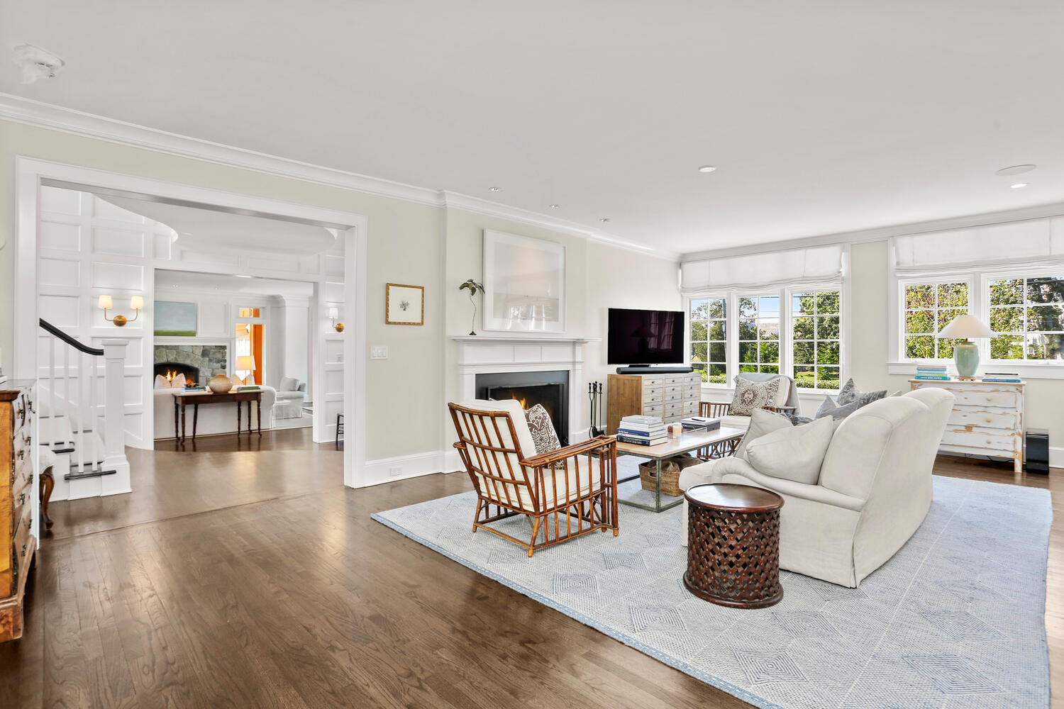 43 Contentment Island Road Darien, CT 06820 - Photo 11 of 59 a living room with fireplace furniture and a flat screen tv