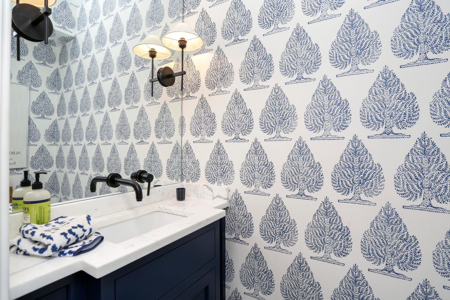 43 Contentment Island Road Darien, CT 06820 - Photo 20 of 59 a bathroom with a sink and a mirror