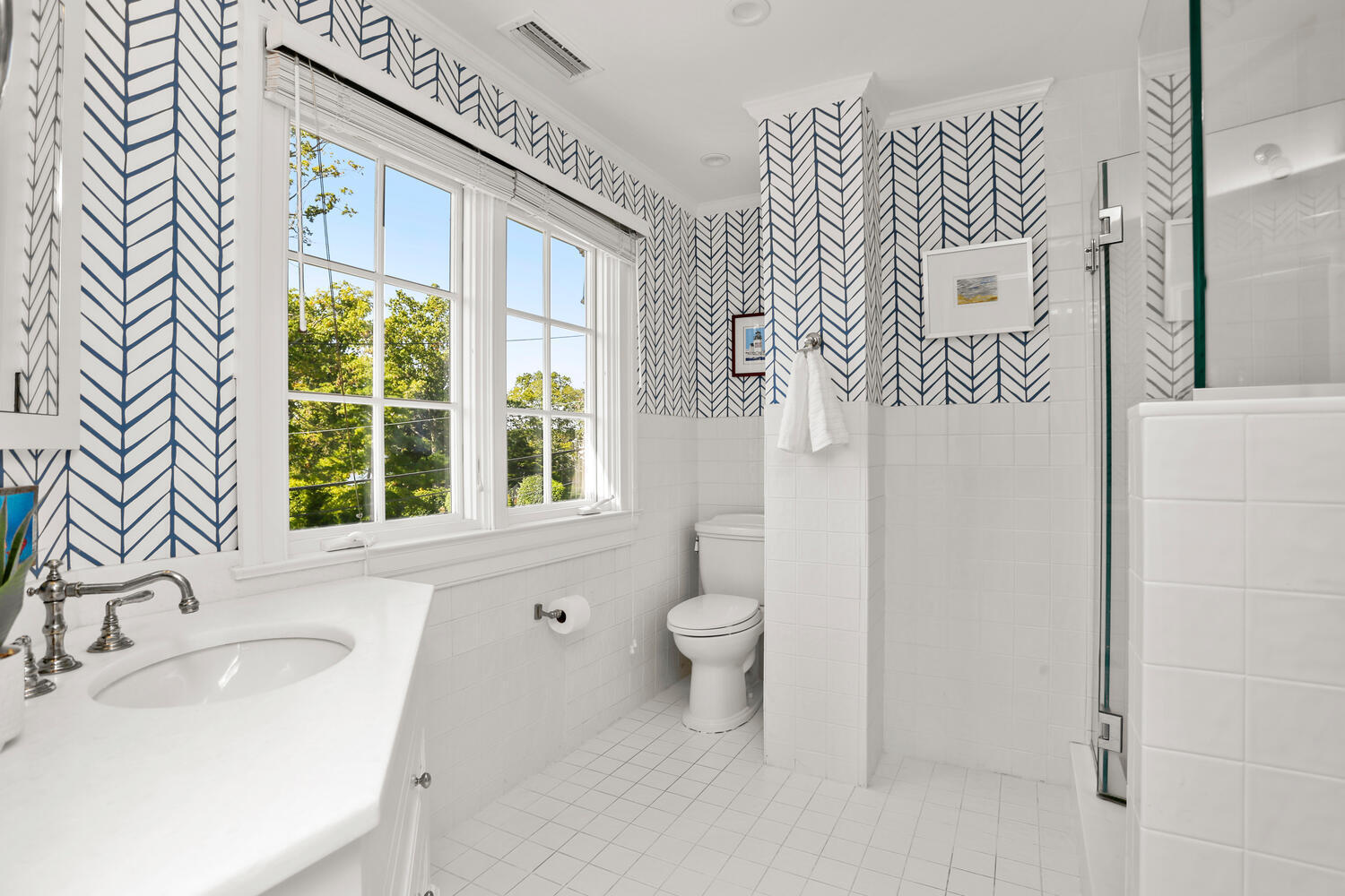 43 Contentment Island Road Darien, CT 06820 - Photo 28 of 59 a bathroom with a sink and a toilet