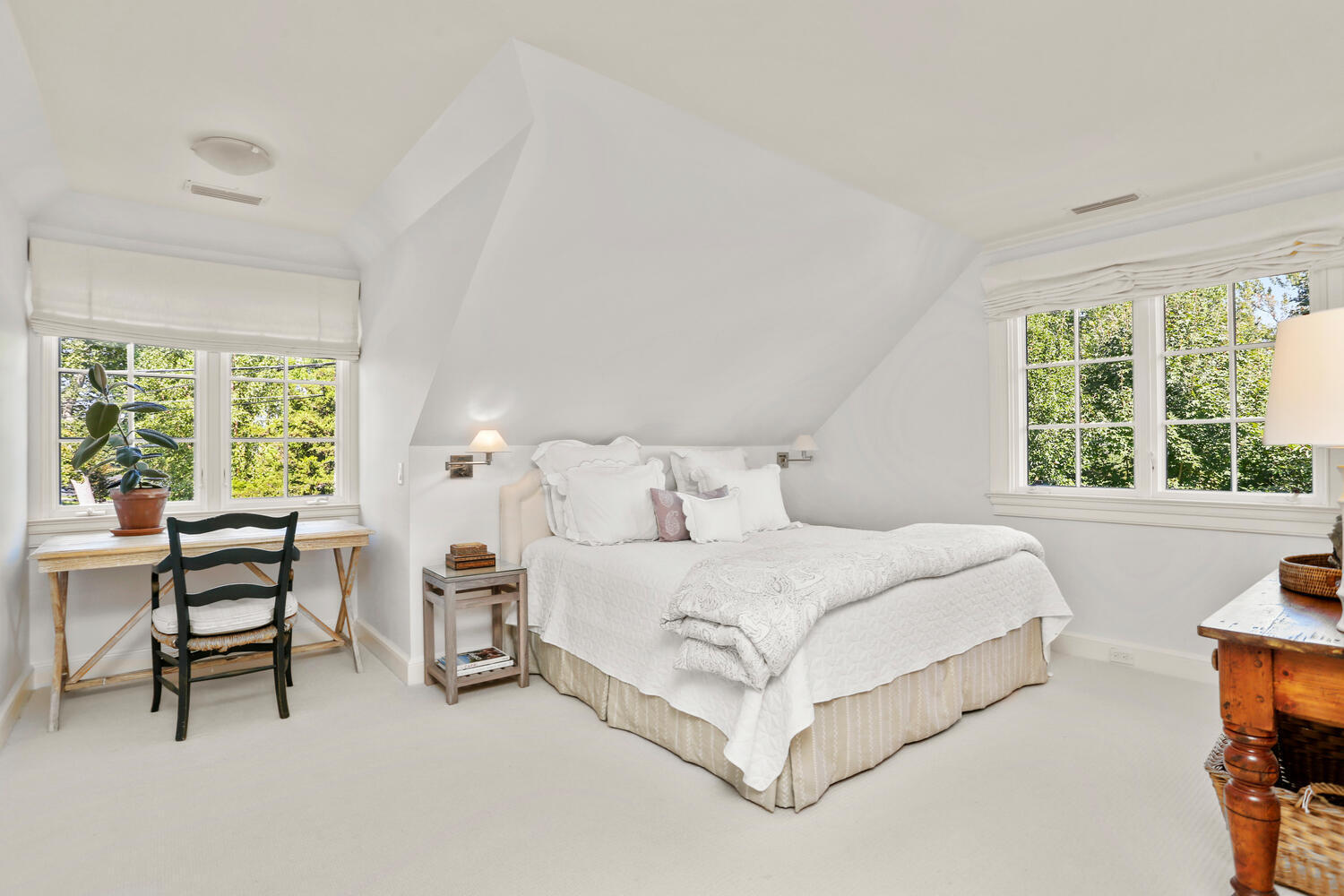 43 Contentment Island Road Darien, CT 06820 - Photo 30 of 59 a bedroom with a bed and a large window