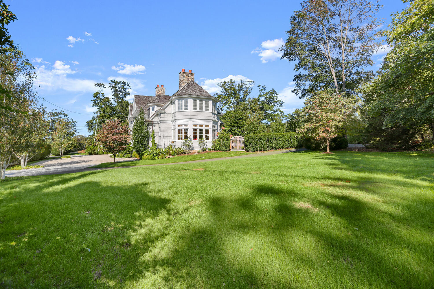 43 Contentment Island Road Darien, CT 06820 - Photo 50 of 59 a view of a house with a big yard