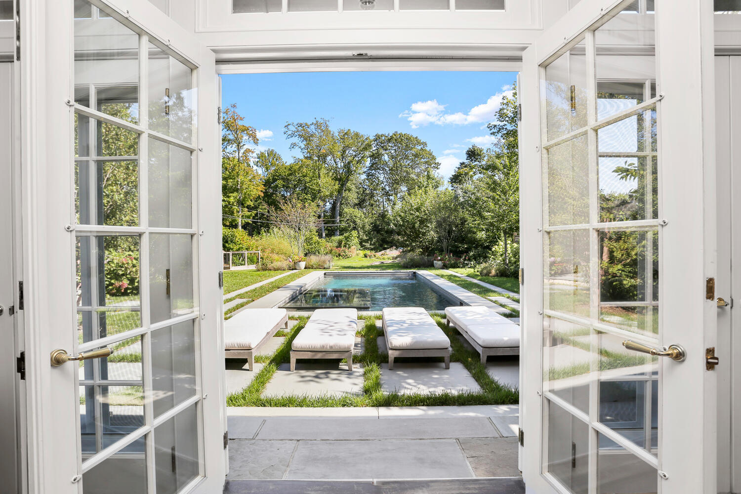 43 Contentment Island Road Darien, CT 06820 - Photo 8 of 59 a view of swimming pool with seating space